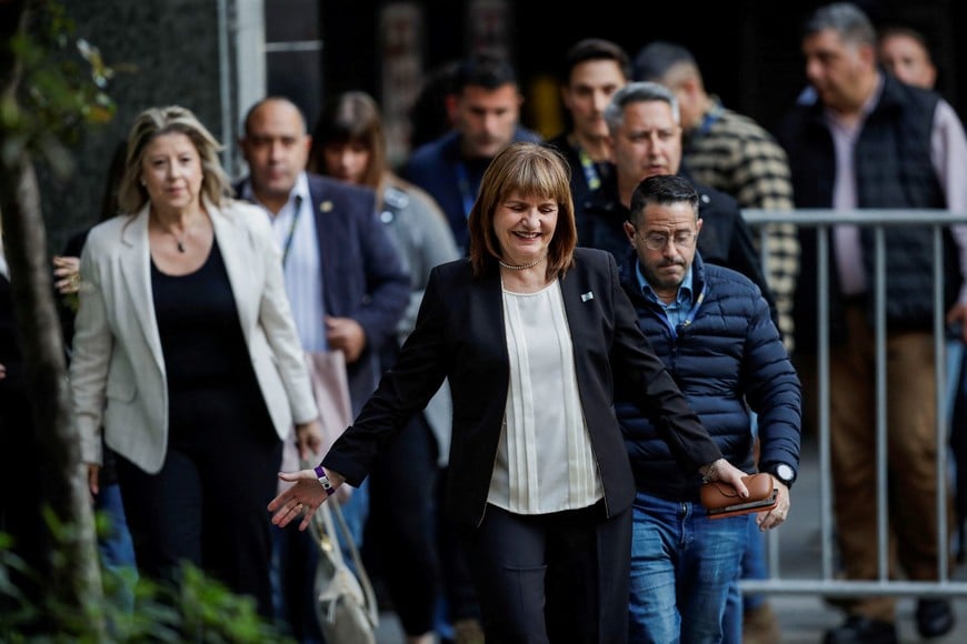 Argentina's Security Minister Patricia Bullrich walks at campaign's headquarters on the day of the midterm election, which is seen as crucial for Argentina's President Javier Milei's administration after U.S. President Donald Trump warned that future support for Argentina would depend on Milei's party performing well in the vote, in Buenos Aires, Argentina, October 26, 2025. REUTERS/Cristina Sille