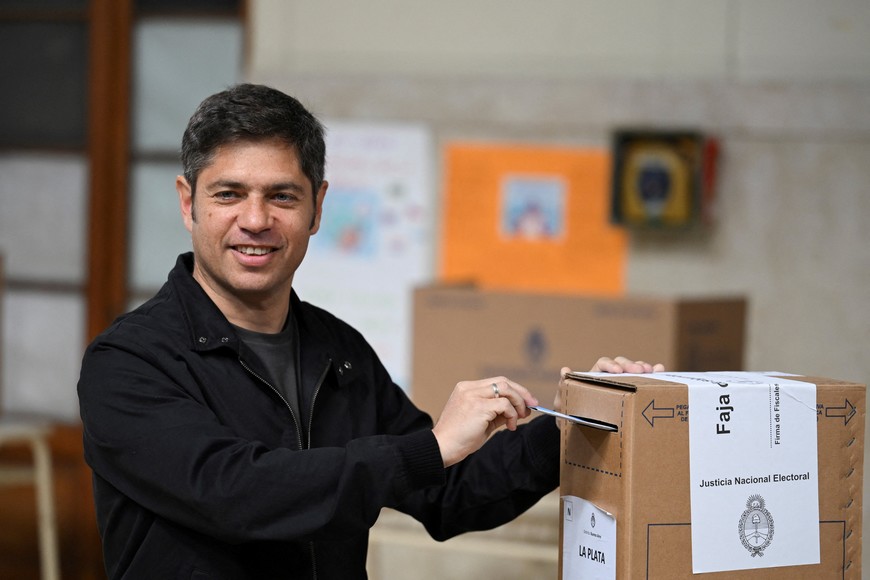 Buenos Aires Province Governor Axel Kicillof votes during the key midterm election, which is seen as crucial for the administration after U.S. President Donald Trump warned that future support for Argentina would depend on Argentine President Javier Milei's party performing well in the vote, in La Plata, Buenos Aires, Argentina, October 26, 2025. REUTERS/Martin Cossarini