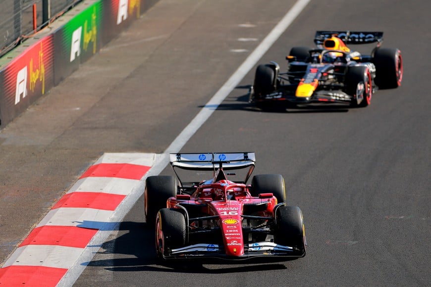Formula One F1 - Mexico City Grand Prix - Autodromo Hermanos Rodriguez, Mexico City, Mexico - October 26, 2025
Second placed Ferrari's Charles Leclerc and third placed Red Bull's Max Verstappen after the Mexico City Grand Prix REUTERS/Eloisa Sanchez