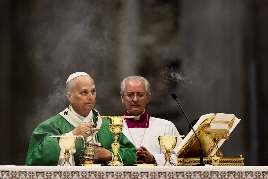 Pope Leo XIV swings a thurible of incense as he leads the Mass for the Jubilee of Synodal Teams and Participatory Bodies at St. Peter's Basilica in the Vatican, October 26, 2025. REUTERS/Yara Nardi