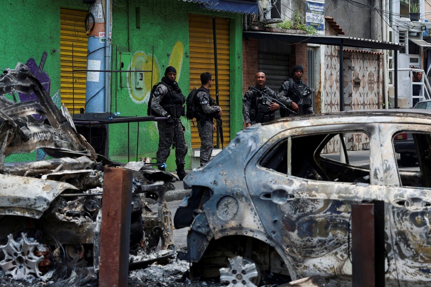 Members of the military police special unit patrol a street during a police operation against drug trafficking at the favela do Penha, in Rio de Janeiro, Brazil October 28, 2025. REUTERS/Aline Massuca