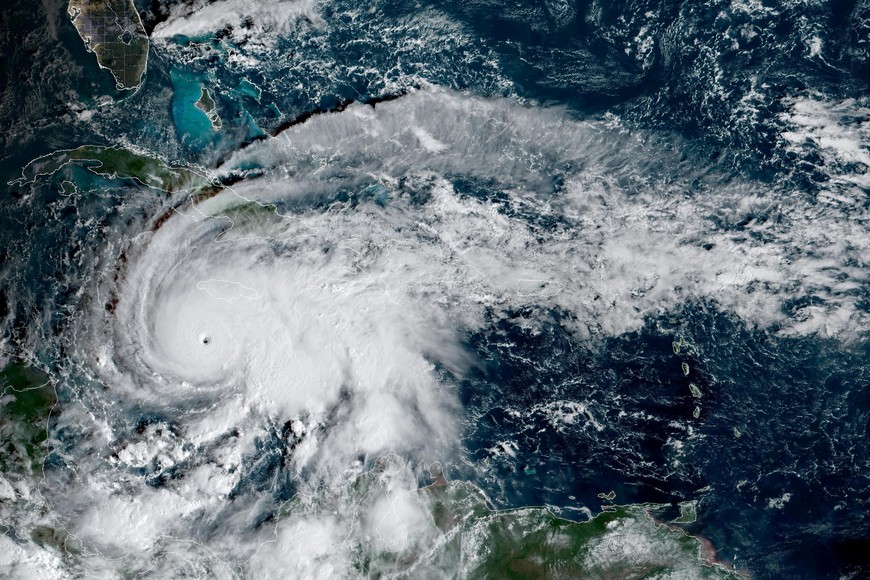 Hurricane Melissa, which has developed into a Category 5 storm, moves north in the Caribbean Sea towards Jamaica and Cuba in a composite satellite image obtained by Reuters on October 27, 2025.  CIRA/NOAA/Handout via REUTERS  THIS IMAGE HAS BEEN SUPPLIED BY A THIRD PARTY. OVERLAY ADDED BY THE SOURCE.