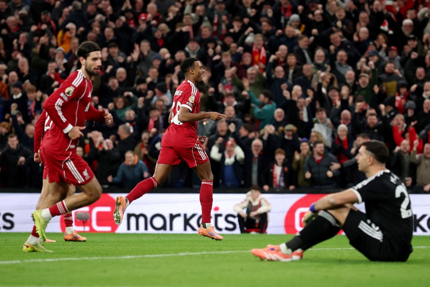 Soccer Football - Premier League - Liverpool v Aston Villa - Anfield, Liverpool, Britain - November 1, 2025
Liverpool's Ryan Gravenberch celebrates scoring their second goal as Aston Villa's Emiliano Martinez looks dejected REUTERS/Phil Noble EDITORIAL USE ONLY. NO USE WITH UNAUTHORIZED AUDIO, VIDEO, DATA, FIXTURE LISTS, CLUB/LEAGUE LOGOS OR 'LIVE' SERVICES. ONLINE IN-MATCH USE LIMITED TO 120 IMAGES, NO VIDEO EMULATION. NO USE IN BETTING, GAMES OR SINGLE CLUB/LEAGUE/PLAYER PUBLICATIONS. PLEASE CONTACT YOUR ACCOUNT REPRESENTATIVE FOR FURTHER DETAILS..