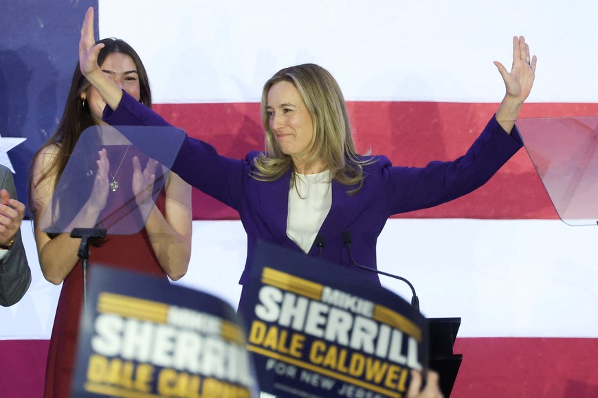 U.S. Representative Mikie Sherrill, Democratic gubernatorial candidate for New Jersey, reacts on stage at her election night rally after U.S. media projected that she won, in East Brunswick, New Jersey, U.S., November 4, 2025. REUTERS/Mike Segar