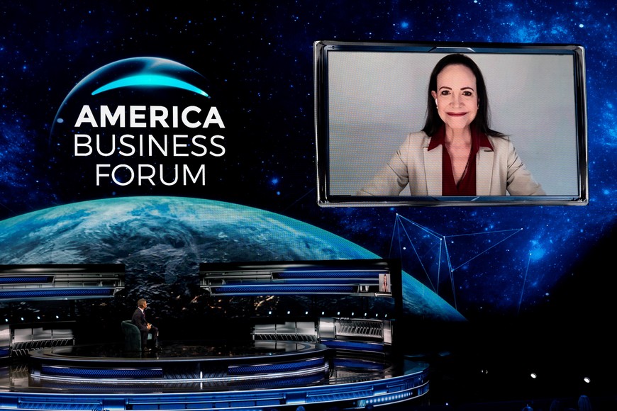 Venezuela's opposition leader and winner of the 2025 Nobel Peace Prize Maria Corina Machado attends the America Business Forum via video conference at Kaseya Center in Miami, Florida, U.S. November 5, 2025. REUTERS/Marco Bello