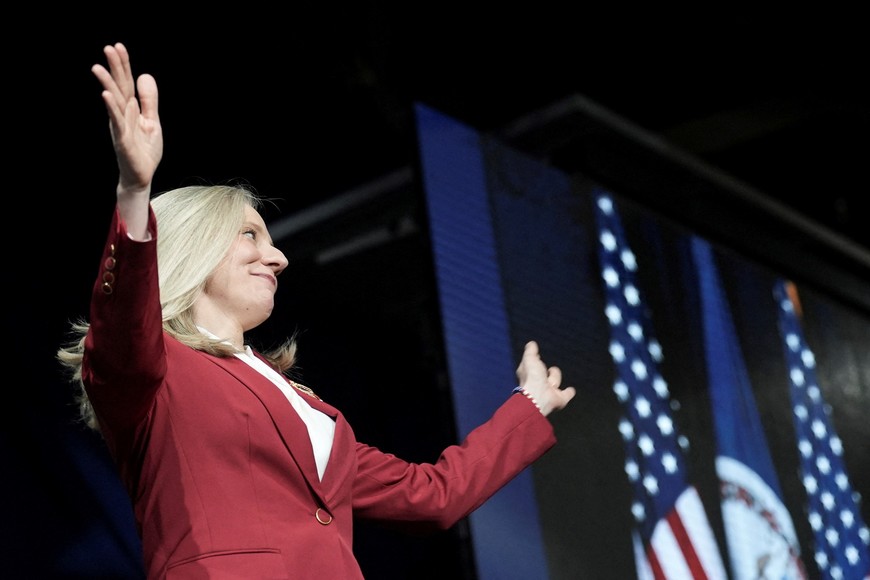 Democrat Abigail Spanberger walks on stage before giving her victory speech over Republican Winsome Earle-Sears in Virginia's race for governor in Richmond, Virginia, U.S. November 4, 2025.  REUTERS/Jay Paul