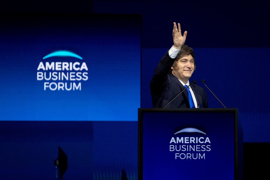 Argentina's President Javier Milei gestures as he takes the stage during the America Business Forum at Kaseya Center in Miami, Florida, U.S. November 6, 2025. REUTERS/Marco Bello