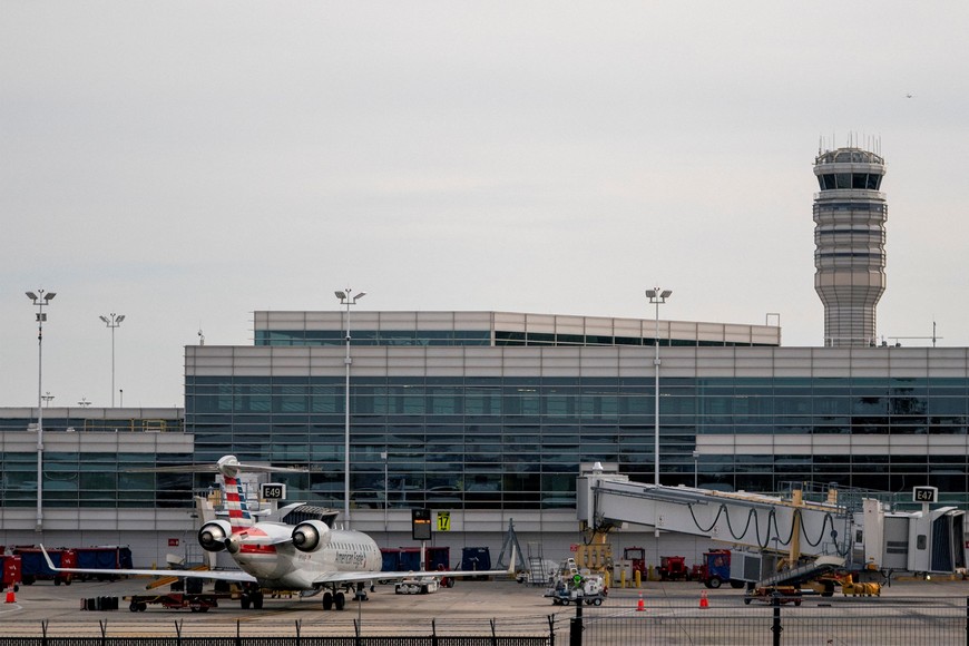 An American Eagle plane stages at Ronald Reagan Washington National Airport as the Trump administration warns of impending cuts to commercial airline operations more than a month into the continuing U.S. government shutdown in Arlington, Virginia, U.S., November 7, 2025. REUTERS/Nathan Howard