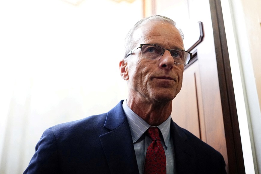 U.S. Senate Majority Leader John Thune (R-SD) looks on outside the Senate Chamber after the vote on the 40th day of the partial government shutdown, in Washington, D.C., U.S., November 9, 2025. REUTERS/Aaron Schwartz
