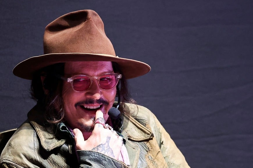 American actor and director Johnny Depp gestures during a masterclass at Teatro Municipal Coliseo Podesta, as he presents his latest film, "Modi, three days on the wing of madness", in La Plata, Argentina, November 12, 2025. REUTERS/Agustin Marcarian