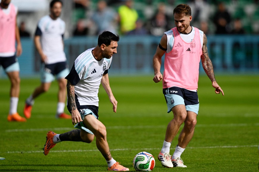 Soccer Football - International Friendly - Argentina Training - Estadio Manuel Martinez Valero, Elche, Spain - November 13, 2025
Argentina's Lionel Messi with Alexis Mac Allister during training REUTERS/Pablo Morano