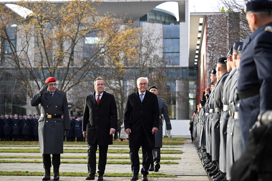 German President Frank-Walter Steinmeier, Defence Minister Boris Pistorius and Inspector General of the Bundeswehr Carsten Breuer walk past soldiers during a solemn oath ceremony marking the 70th anniversary of the German Armed Forces, the Bundeswehr, in front of the Chancellery in Berlin, Germany, November 12, 2025. REUTERS/Annegret Hilse