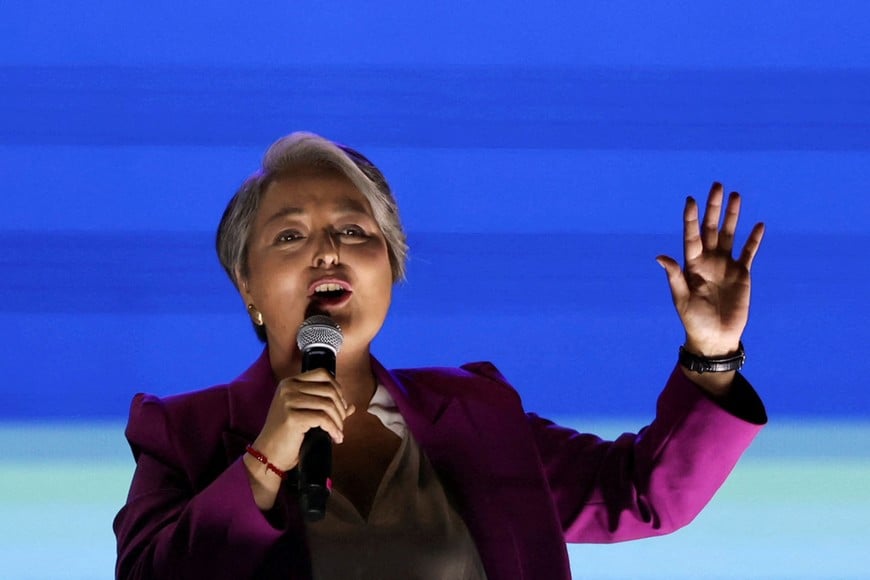 FILE PHOTO: Jeannette Jara, presidential candidate of the ruling leftist coalition and member of the Communist Party, addresses supporters during one of her closing campaign rallies ahead of the November 16 presidential election, in Santiago, Chile, November 11, 2025. REUTERS/Pablo Sanhueza/File Photo