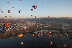 Hot air balloons fly over Parque Metropolitano during the International Hot Air Balloon Festival in Leon, Guanajuato, Mexico, November 17, 2025. REUTERS/Henry Romero