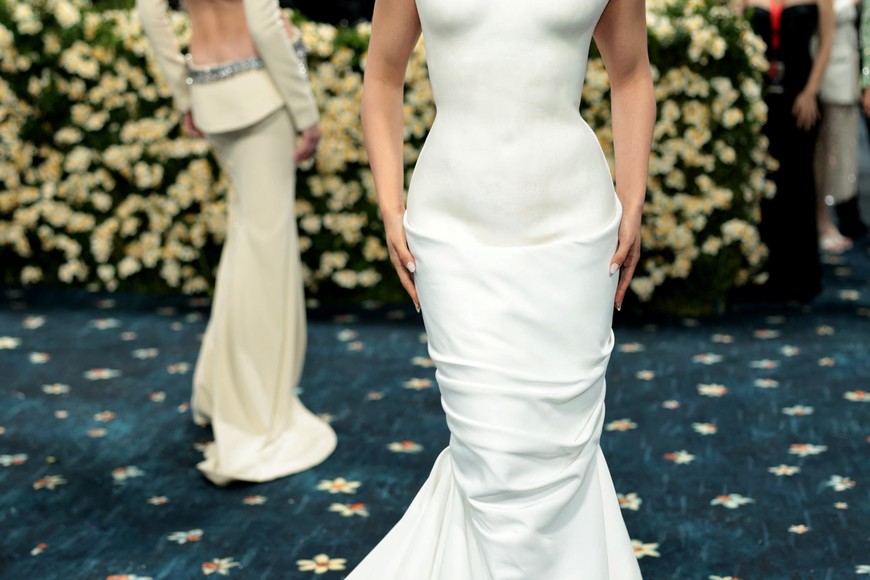 Rosalia poses during the Met Gala, an annual fundraising gala held for the benefit of the Metropolitan Museum of Art's Costume Institute with this year's theme 'Superfine: Tailoring Black Style,' in New York City, New York, U.S., May 5, 2025. REUTERS/Mario Anzuoni