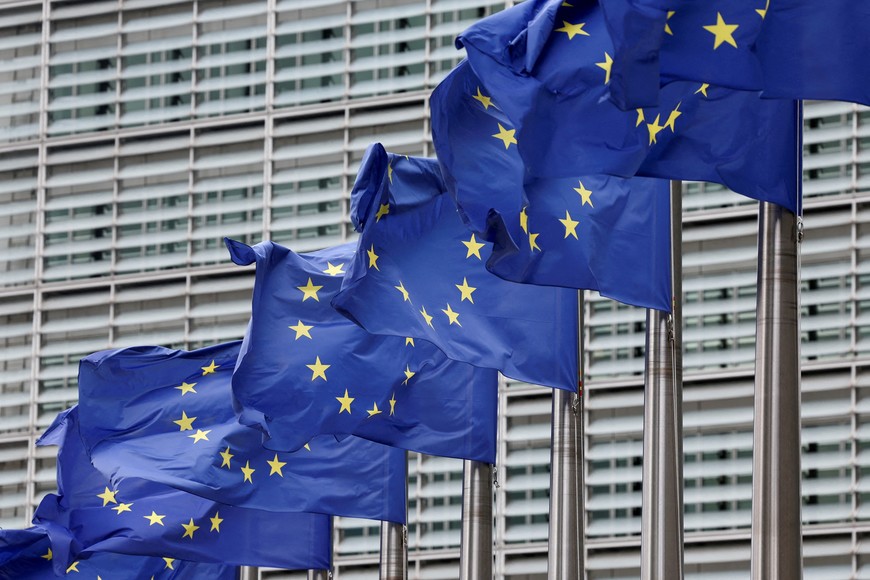 FILE PHOTO: European Union flags flutter outside the EU Commission headquarters in Brussels, Belgium July 16, 2025. REUTERS/Yves Herman//File Photo