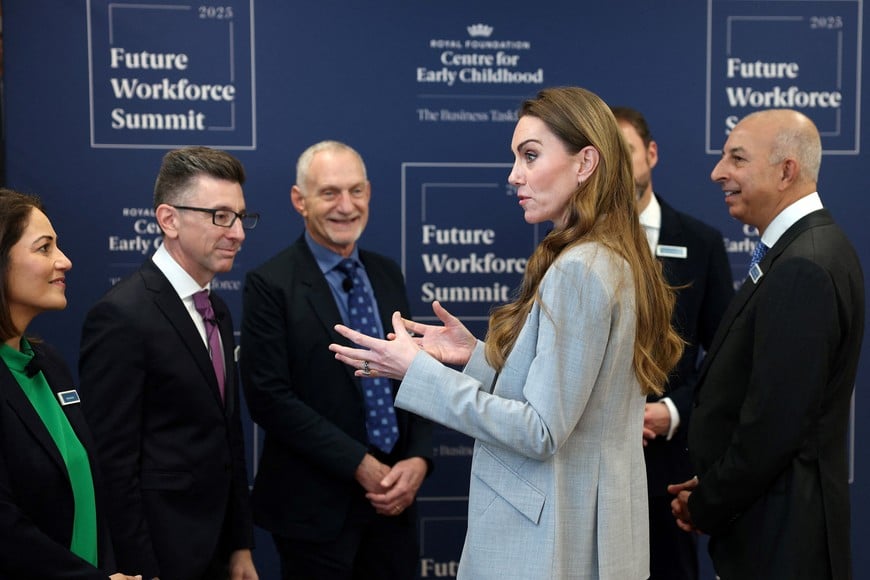 Britain's Catherine, Princess of Wales talks with British journalist and broadcaster Mishal Hussein, Yale Professor Marc Brackett and Harvard Medical School Professor Robert Waldinger, as she attends The Future Workforce Summit, hosted by The Royal Foundation Business Taskforce for Early Childhood, in London on November 18, 2025. ADRIAN DENNIS/Pool via REUTERS