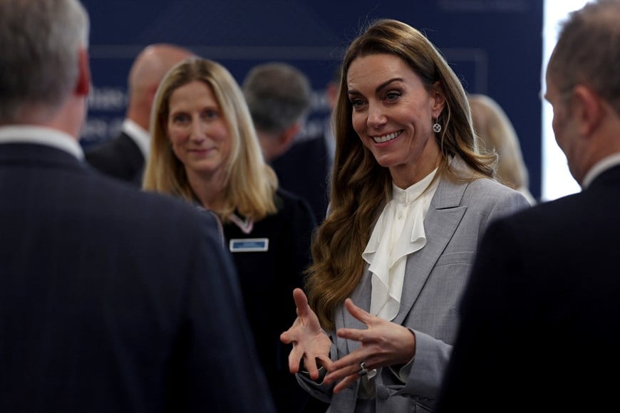 Britain's Catherine, Princess of Wales talks with attendees at The Future Workforce Summit, hosted by The Royal Foundation Business Taskforce for Early Childhood, in London on November 18, 2025.    ADRIAN DENNIS/Pool via REUTERS