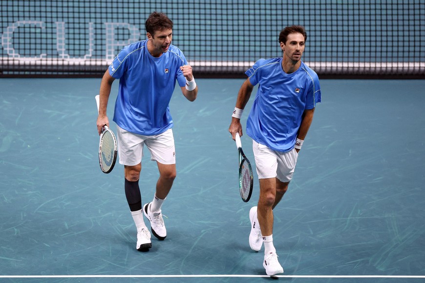 Tennis - Davis Cup - Final 8 - Argentina v Germany - SuperTennis Arena, Bologna, Italy - November 20, 2025  
Argentina's Andres Molteni and Argentina's Horacio Zeballos react during their doubles match against Germany's Kevin Krawietz and Germany's Tim Puetz REUTERS/Guglielmo Mangiapane