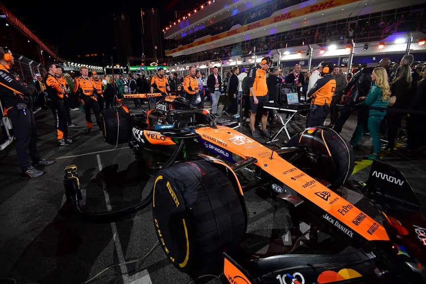 Nov 21, 2025; Las Vegas, NV, USA; The crew of McLaren driver Oscar Piastri (81) prepare his car for the Las Vegas Grand Prix at Las Vegas Strip Circuit. Mandatory Credit: Gary A. Vasquez-Imagn Images