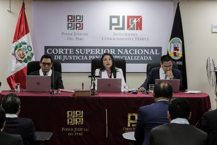 Judge Giovanni Felix Palma, Magistrate Fernanda Ayasta Nassif, and Judge Andy Junior Rodriguez Dominguez attend the reading of the sentence for the former Peruvian President Martin Vizcarra in corruption cases tied to the Moquegua Hospital and Lomas de Ilo construction projects, in which he was accused of receiving bribes while serving as governor,  in Lima, Peru, on November 26, 2025. REUTERS/Gerardo Marin