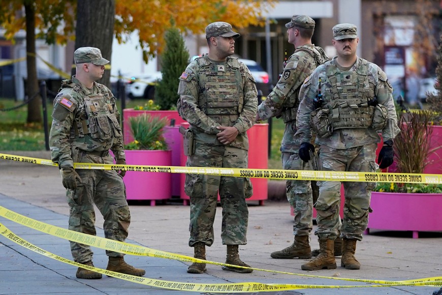 National Guard members stand in a cordoned-off area after two National Guard members were reportedly shot near the White House in Washington, D.C., U.S., November 26, 2025. REUTERS/Nathan Howard