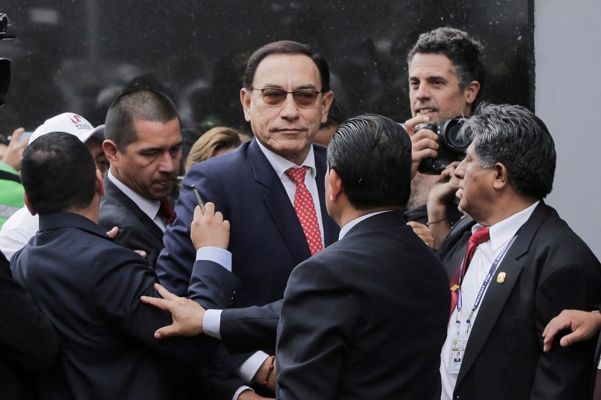 Former Peruvian President Martin Vizcarra arrives at court to hear the sentence in corruption cases tied to the Moquegua Hospital and Lomas de Ilo construction projects, in which he was accused of receiving bribes while serving as governor, in Lima, Peru, November 26, 2025. REUTERS/Gerardo Marin