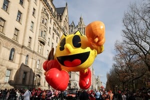 The PAC-MAN balloon flies during the 2025 Macy's Thanksgiving Day Parade in New York City, U.S., November 27, 2025. REUTERS/Jeenah Moon