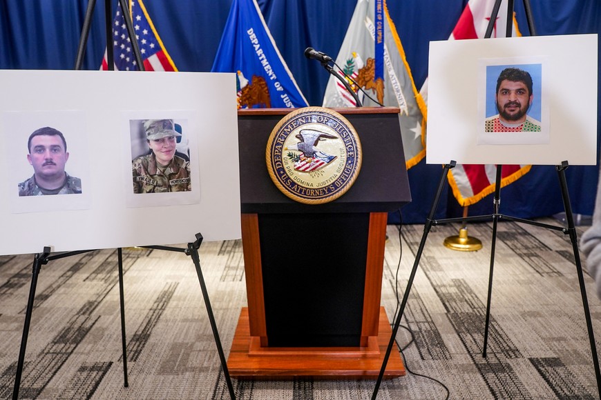 Pictures of National Guard members Andrew Wolfe and Sarah Beckstrom, who were shot on November 26 in Washington, are displayed next to a picture of the suspect of the shooting, Afghan national Rahmanullah Lakanwal, on the day of a press conference with FBI Director Kash Patel, U.S. Attorney for D.C. Jeanine Pirro and other authorities, in Washington, D.C., U.S., November 27, 2025. REUTERS/Nathan Howard
