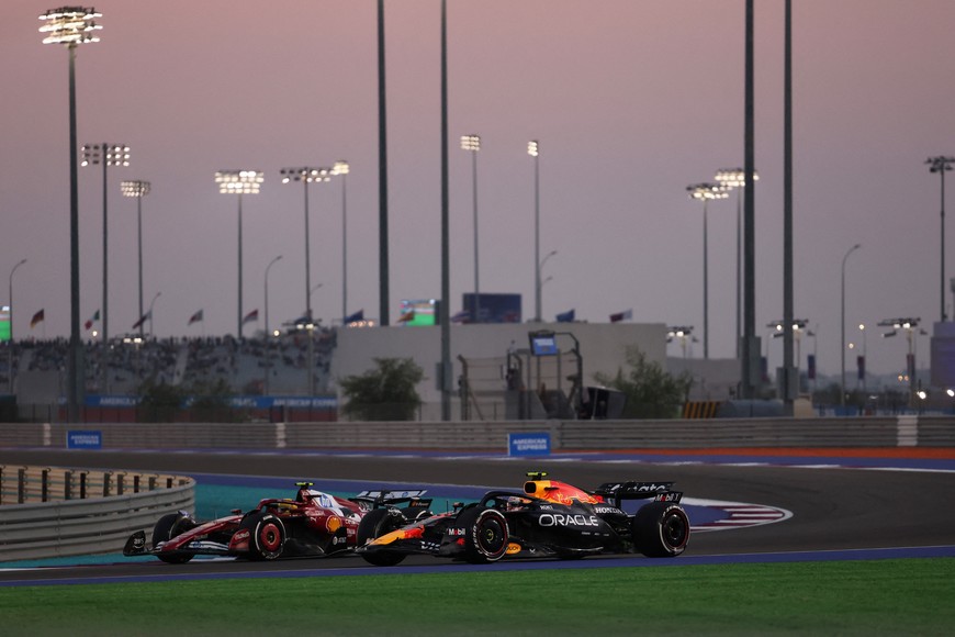 Formula One F1 - Qatar Grand Prix - Lusail International Circuit, Lusail, Qatar - November 28, 2025
Ferrari's Lewis Hamilton and Red Bull's Yuki Tsunoda during practice REUTERS/Mohammed Salem