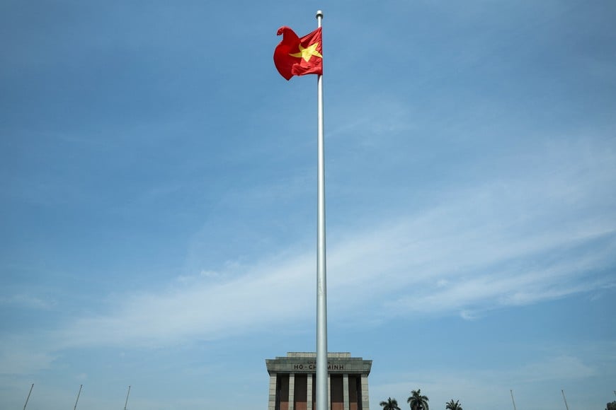FILE PHOTO: A Vietnamese flag flutters on the day Chinese President Xi Jinping visits the Ho Chi Minh Mausoleum during his visit to Hanoi, Vietnam, April 15, 2025. REUTERS/Athit Perawongmetha/Pool/File Photo
