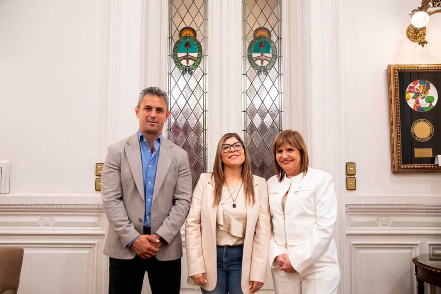 Razzini junto a Menem y Bullrich.