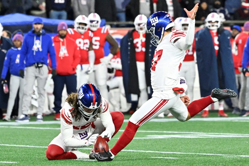 Dec 1, 2025; Foxborough, Massachusetts, USA; New York Giants place kicker Younghoe Koo (37) makes an extra point during the second quarter against the New England Patriots at Gillette Stadium. Mandatory Credit: Eric Canha-Imagn Images