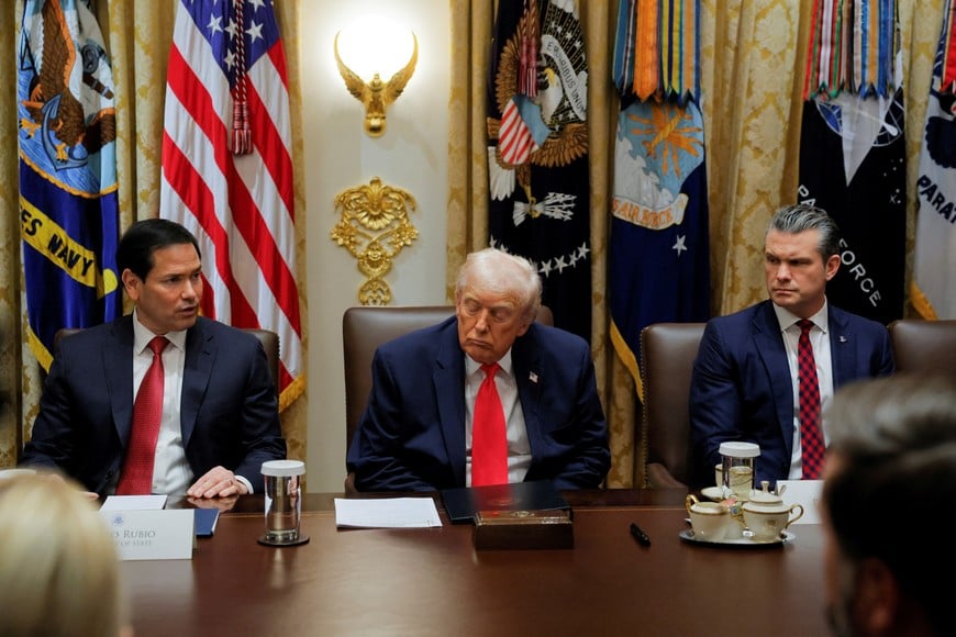 U.S. President Donald Trump attends a cabinet meeting with U.S. Secretary of Defense Pete Hegseth and U.S. Secretary of State Marco Rubio, at the White House in Washington, D.C., U.S., December 2, 2025. REUTERS/Brian Snyder