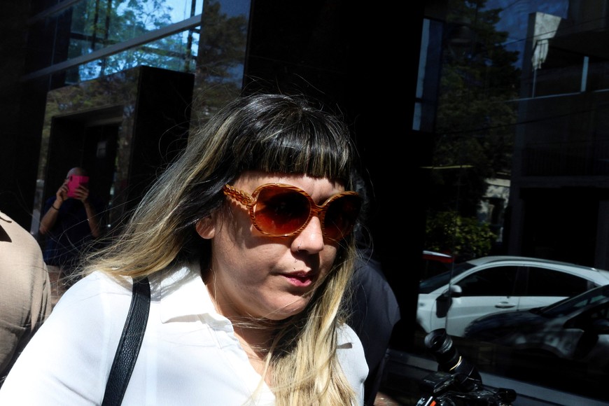 Former nurse of Argentine soccer player Diego Armando Maradona, Dahiana Gisela Madrid, arrives at a courthouse for a case in which eight medical professionals and nurses are accused of manslaughter through eventual intent due to their negligence, in the death of Maradona, in San Isidro, on the outskirts of Buenos Aires, Argentina October 2, 2024. REUTERS/Matias Baglietto?
