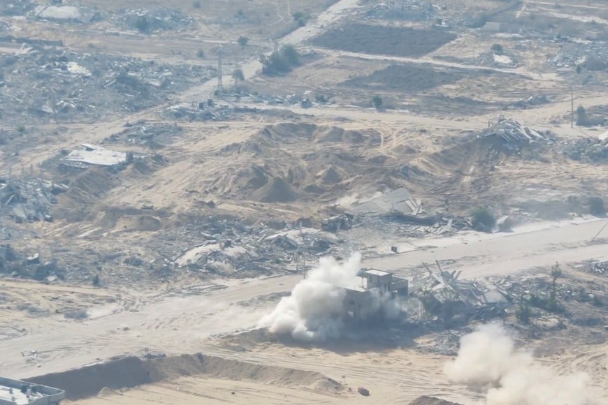 Israeli Army video shows strikes around area alleged to be Hamas tunnel entrance, at the location given as Khan Younis, in the southern Gaza Strip, according to Israeli Army, in this screen grab from a handout video released on August 20, 2025. Israeli Army/Handout via REUTERS  THIS IMAGE HAS BEEN SUPPLIED BY A THIRD PARTY. MANDATORY CREDIT
 
Verification lines: 
- Reuters was not able to independently verify the location and the date when the video was filmed.