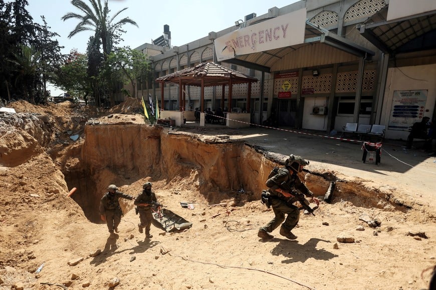 Israeli soldiers walk out from a tunnel underneath the European Hospital in Khan Younis at the Gaza Strip, amid the ongoing ground operation of the Israeli army against Palestinian Islamist group Hamas, June 8, 2025. REUTERS/Ronen Zvulun EDITOR'S NOTE: REUTERS PHOTOGRAPHS WERE REVIEWED BY THE IDF AS PART OF THE CONDITIONS OF THE EMBED. NO PHOTOS WERE REMOVED.     TPX IMAGES OF THE DAY