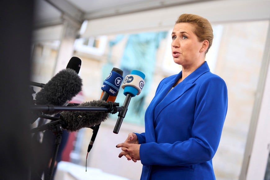 Denmark's Prime Minister Mette Frederiksen speaks to members of the media, during arrival for an informal summit at the Danish Parliament at Christiansborg Castle in Copenhagen, Denmark, October 1, 2025. Ritzau Scanpix/Thomas Traasdahl via REUTERS    ATTENTION EDITORS - THIS IMAGE WAS PROVIDED BY A THIRD PARTY. DENMARK OUT. NO COMMERCIAL OR EDITORIAL SALES IN DENMARK.
