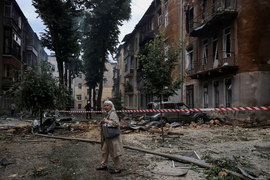 A resident stands at the site of a Russian drone strike, amid Russia's attack on Ukraine, in Odesa, Ukraine June 20, 2025. REUTERS/Nina Liashonok