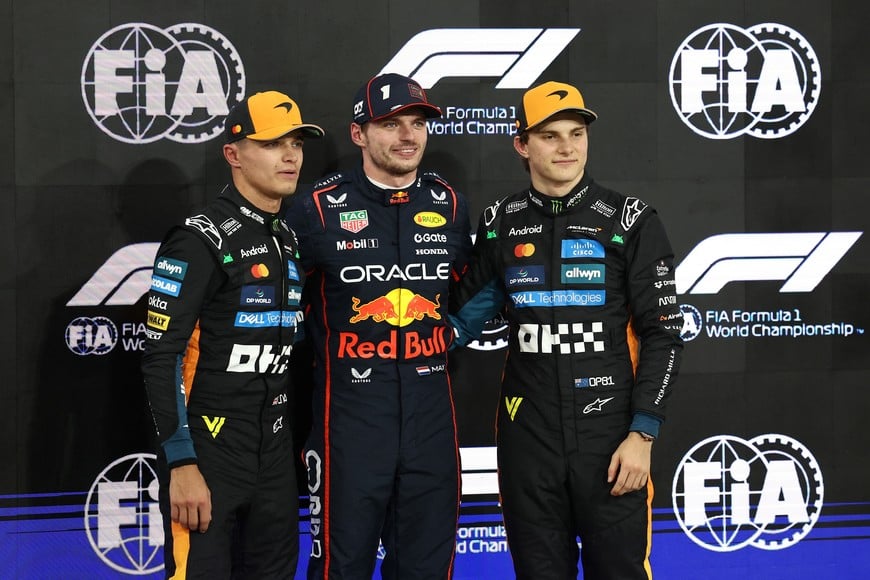 Formula One F1 - Abu Dhabi Grand Prix - Yas Marina Circuit, Abu Dhabi, United Arab Emirates - December 6, 2025
Red Bull's Max Verstappen celebrates after qualifying in pole position with second placed McLaren's Lando Norris and third placed McLaren's Oscar Piastri REUTERS/Amr Alfiky