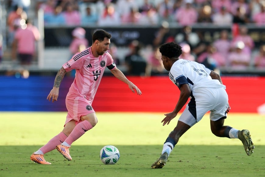 Dec 6, 2025; Fort Lauderdale, Florida, USA; Inter Miami forward Lionel Messi (10) controls the ball defended by Vancouver Whitecaps FC midfielder Ralph Priso (6) in the second half during the 2025 MLS Cup at Chase Stadium. Mandatory Credit: Nathan Ray Seebeck-Imagn Images