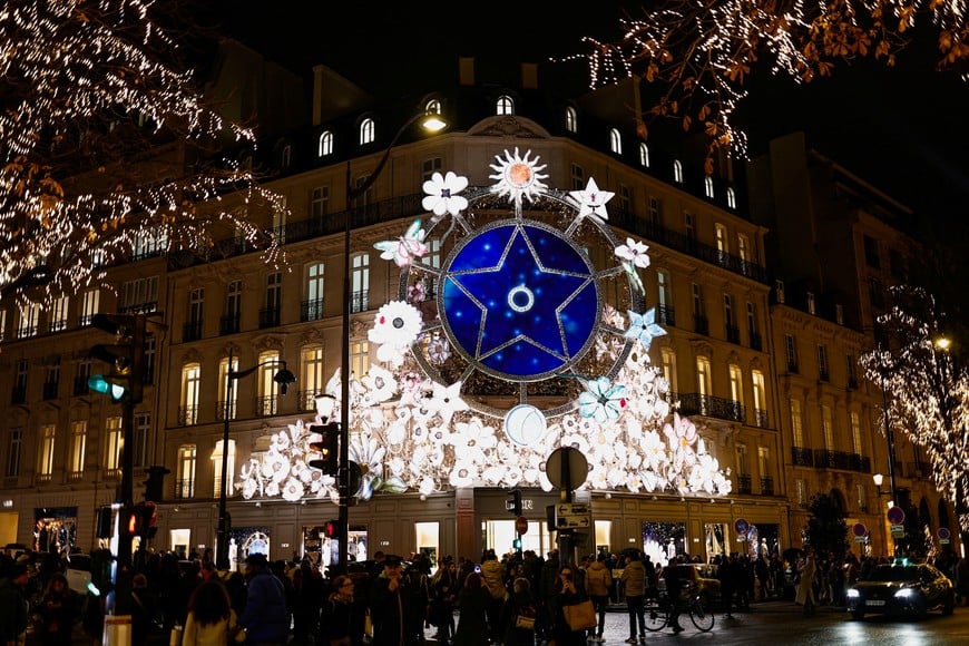 Festive lights and decorations adorn a Christian Dior luxury store in France, December 7, 2025. REUTERS/Benoit Tessier
