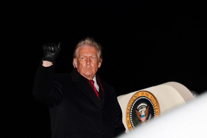 U.S. President Donald Trump boards Air Force One to depart for Washington from Wilkes-Barre Scranton International Airport in Avoca, Pennsylvania, U.S. December 9, 2025. REUTERS/Jonathan Ernst