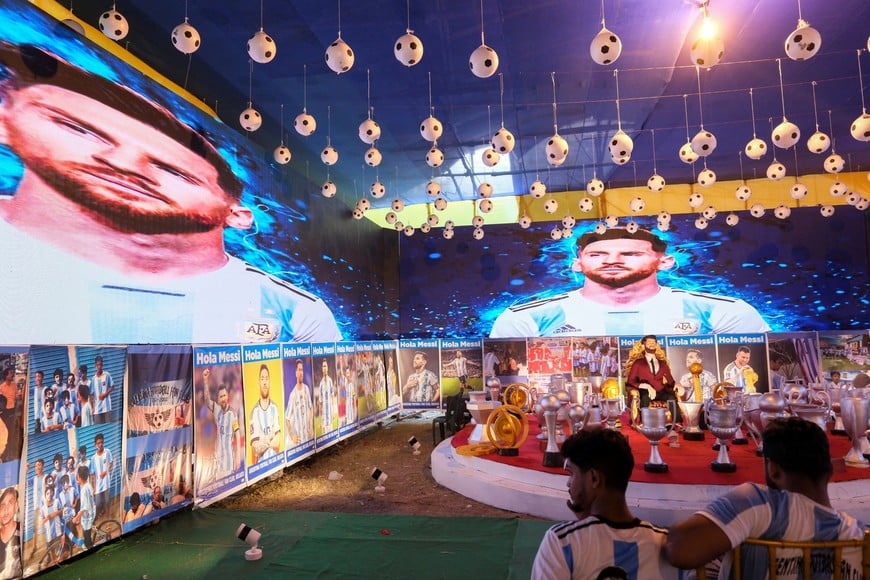 Fans visit a temporary museum honouring soccer player Lionel Messi's long career ahead of his India tour, Kolkata, India, December 11, 2025. REUTERS/Sahiba Chawdhary