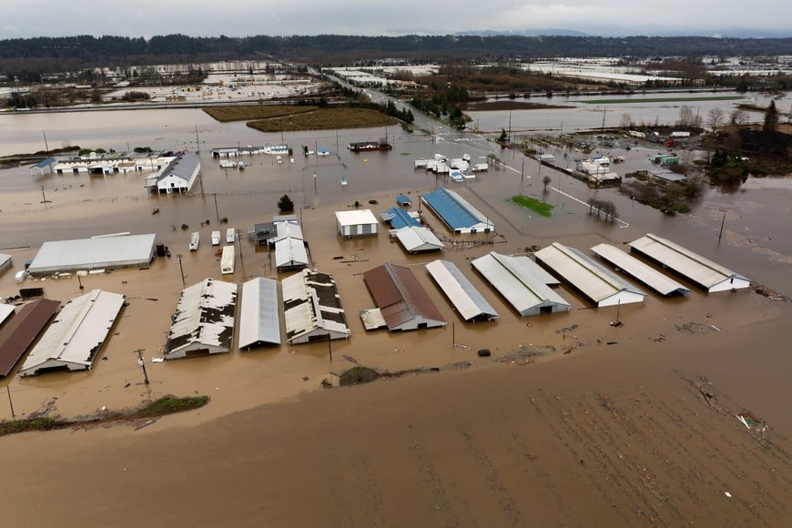 A drone view shows an area flooded by the Green River, after multiple atmospheric rivers brought rain and flooding to the Pacific Northwest, in Kent, Washington, U.S., December 15, 2025.  REUTERS/David Ryder