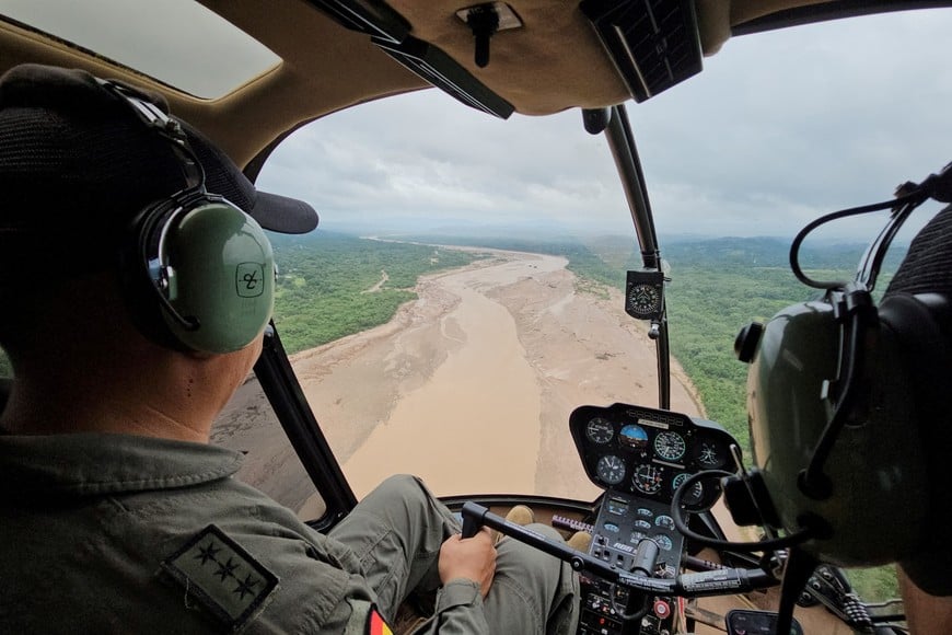 Aerial view shows flooded areas after torrential rain left communities isolated, in Santa Cruz region, Bolivia, December 14, 2025.  Vice Ministry of Civil Defense/Handout via REUTERS ATTENTION EDITORS - THIS IMAGE HAS BEEN SUPPLIED BY A THIRD PARTY. MANDATORY CREDIT. NO RESALES. NO ARCHIVES