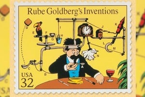 Uno de los inventos de Rube Goldberg, la servilleta automática, en imagen plasmada en una estampilla del correo de su país. Al ingenioso y singular ingeniero le cabe perfectamente la definición de autodidacta: comenzó a calcar ilustraciones cuando tenía solo cuatro años y recibió sus únicas clases de dibujo de un pintor de carteles local.?