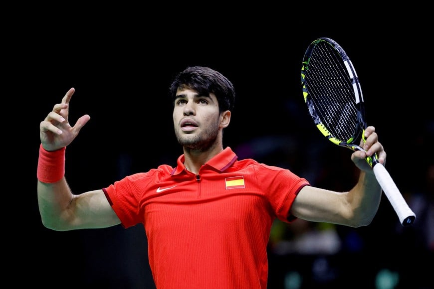 FILE PHOTO: Tennis - Davis Cup Finals - Quarter Final - Netherlands v Spain - Palacio de Deportes Jose Maria Martin Carpena Arena, Malaga, Spain - November 19, 2024 
Spain's Carlos Alcaraz  reacts during their match against Netherlands' Botic van de Zandschulp and Wesley Koolhof REUTERS/Juan Medina/File Photo