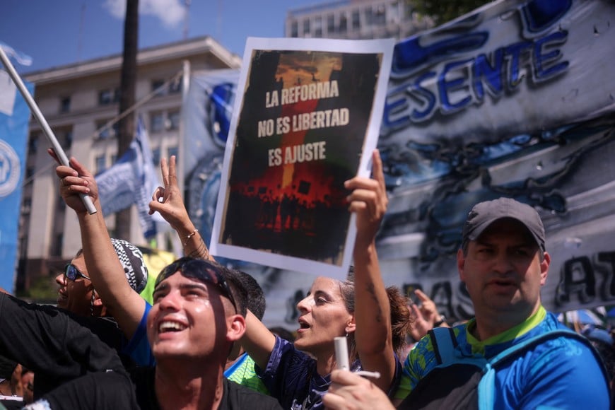 Demonstrators attend a protest organised by Argentina's General Confederation of Labor (CGT) against the government's proposed labour law reform, at Plaza de Mayo in Buenos Aires, Argentina, December 18, 2025. REUTERS/Tomas Cuesta