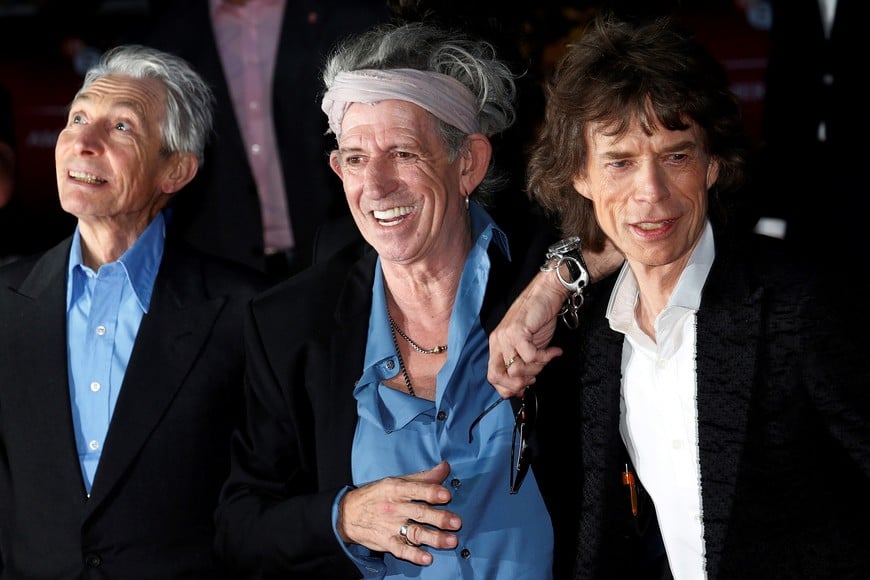 FILE PHOTO: Rolling Stones members Charlie Watts (L), Keith Richards (C) and Mick Jagger arrive for the world premiere of "Crossfire Hurricane" at the Odeon Leicester Square in London October 18, 2012. REUTERS/Suzanne Plunkett/File Photo